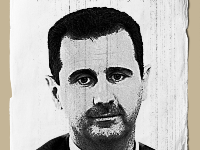Zum Red Hand Day sehen wir ein Wanted-Schild auf dem der syrische Präsident Bashar al-Assad zu sehen ist.